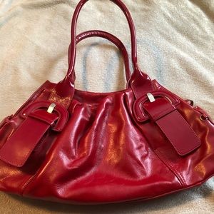 Red Handbag by FIRST